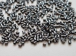 450 st svarta klämpärlor, crimp beads (1,5 mm)