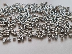 450 st silverfärgade klämpärlor, crimp beads (1,5 mm)