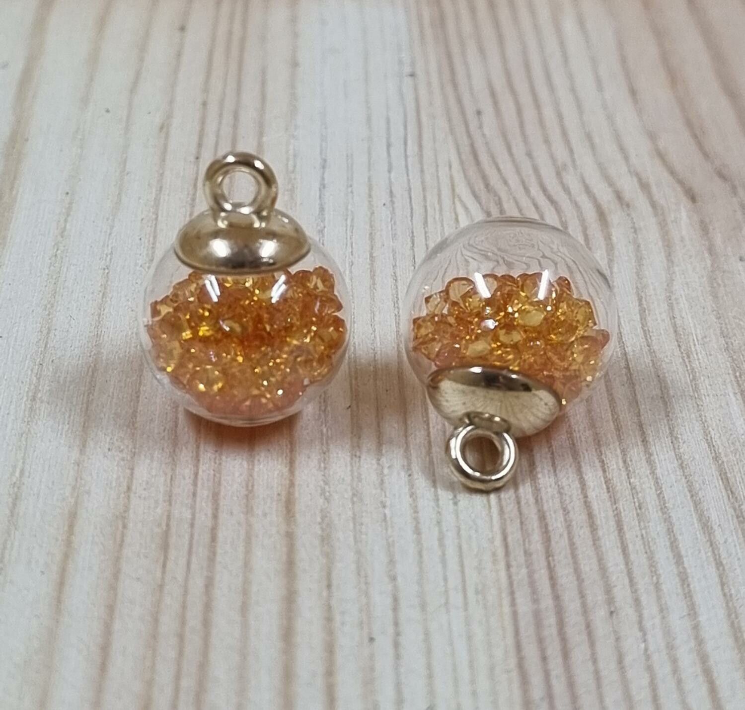 2 st runda, fyllda miniflaskor / glasflaskor med ögla (Orange fyllning)