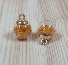 2 st runda, fyllda miniflaskor / glasflaskor med ögla (Orange fyllning)