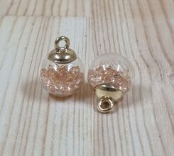2 st runda glasberlocker, miniflaskor / glasbollar med ögla (beige fyllning)