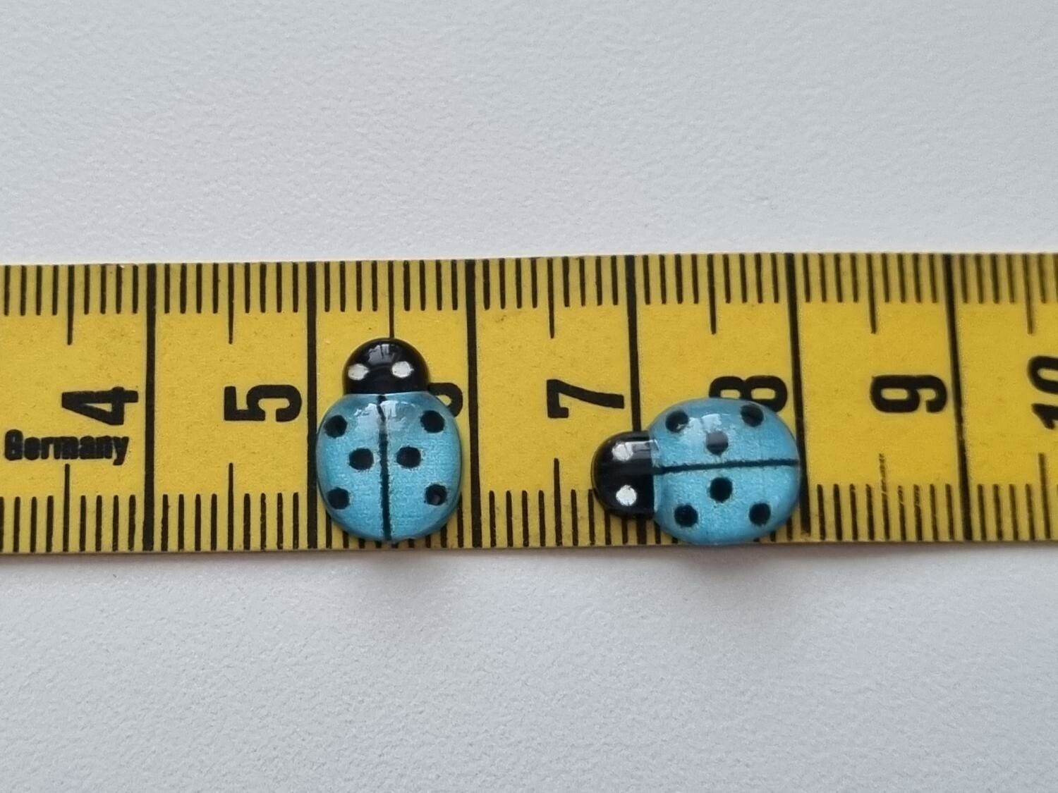 25 st nyckelpigor i resin, miniatyrer (blå)