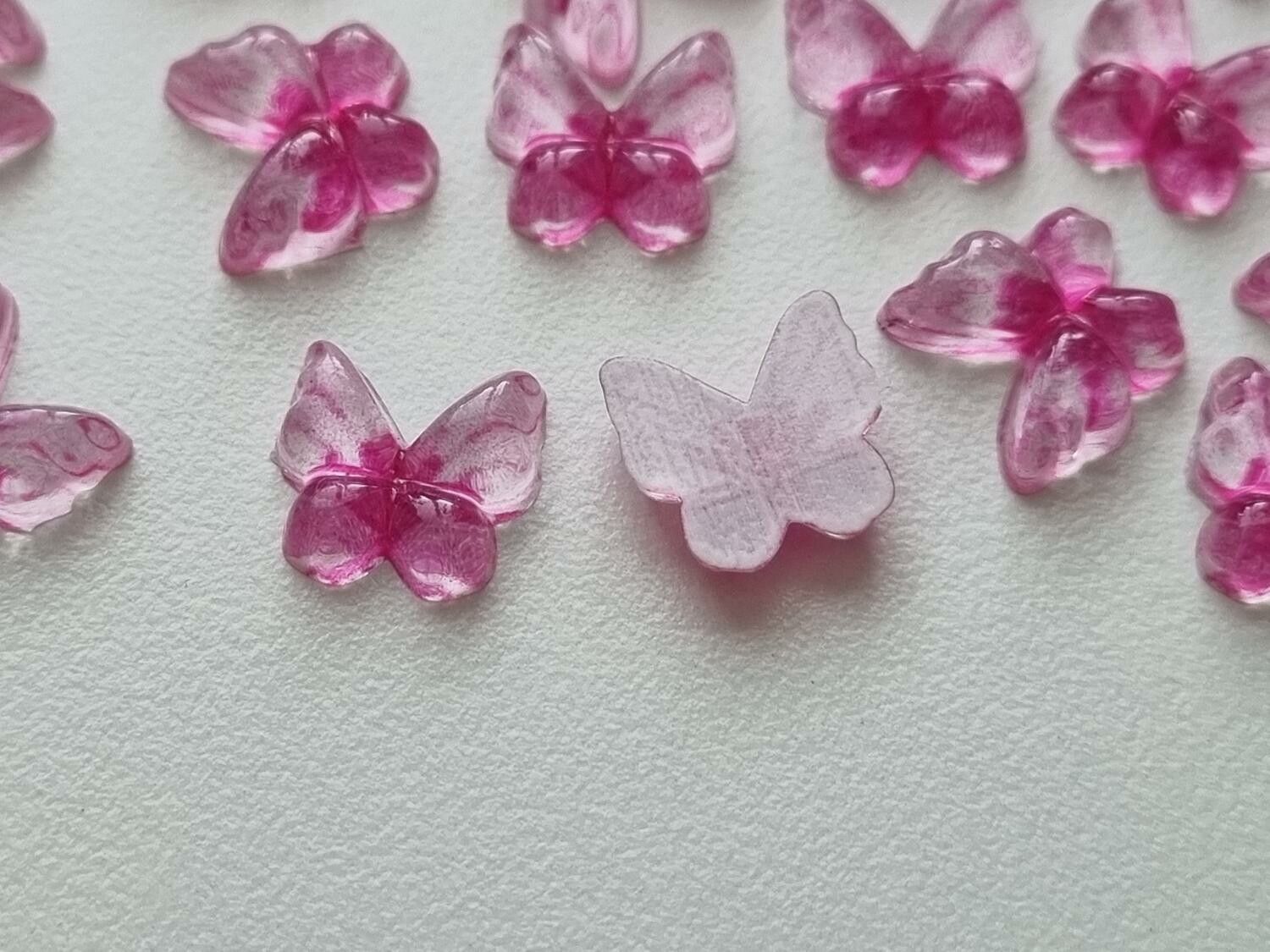 25 st fjärilar i resin, miniatyr fjärilar (rosa)