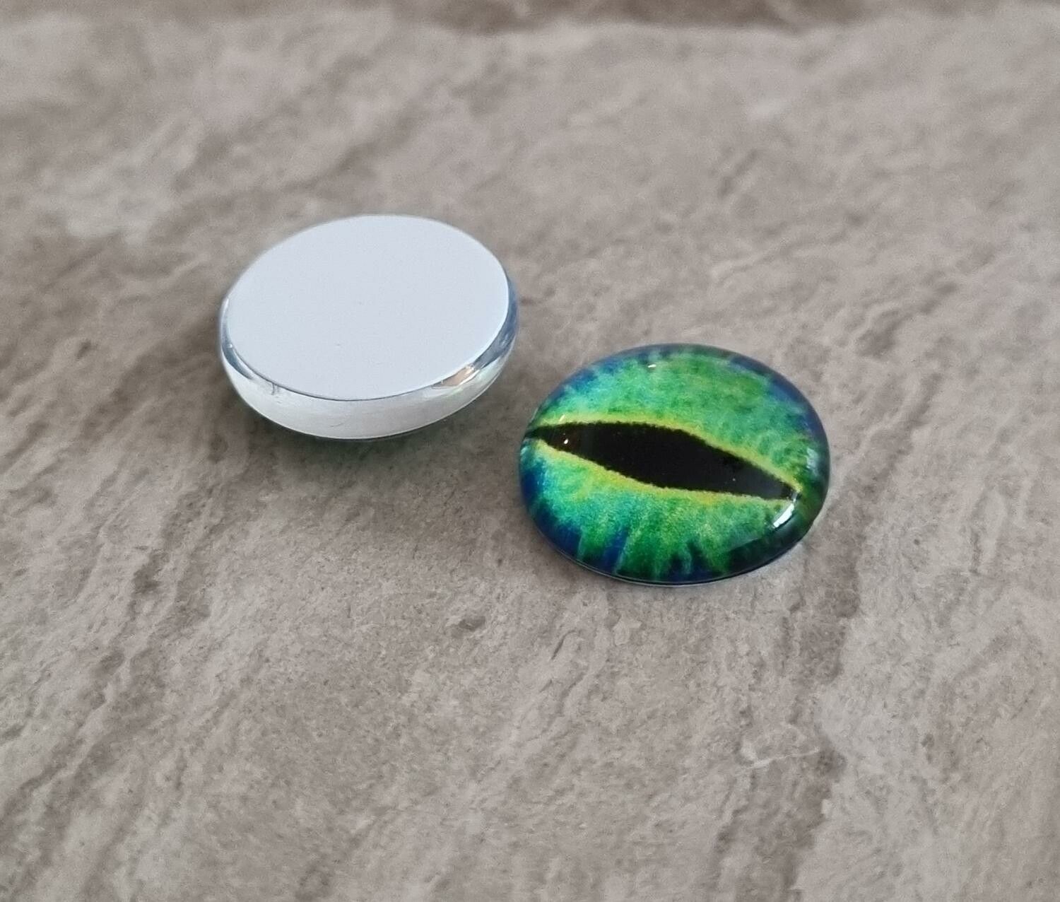 2 st drakögon kattögon i glas, glasinfattningar, cabochoner (12 mm)