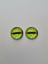 2 st drakögon kattögon i glas, glasinfattningar, cabochoner (12 mm)