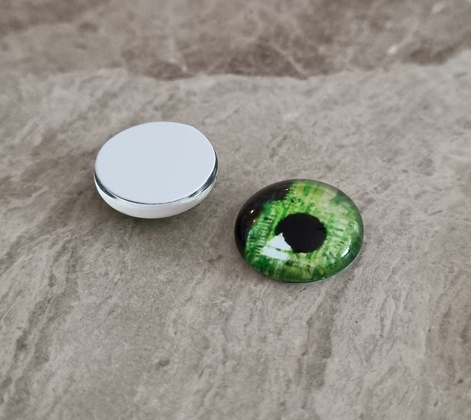 2 st drakögon kattögon i glas, glasinfattningar, cabochoner (12 mm)