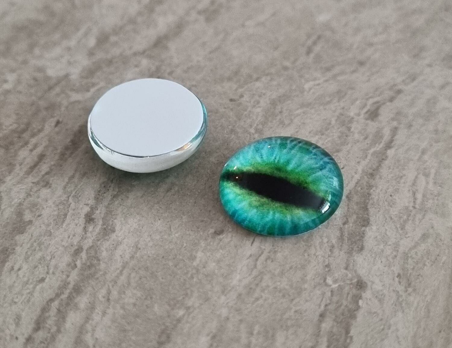 2 st drakögon kattögon i glas, glasinfattningar, cabochoner (12 mm)
