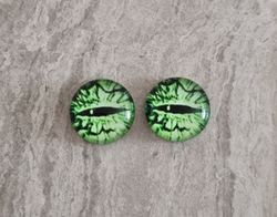 2 st drakögon kattögon i glas, glasinfattningar, cabochoner (12 mm)