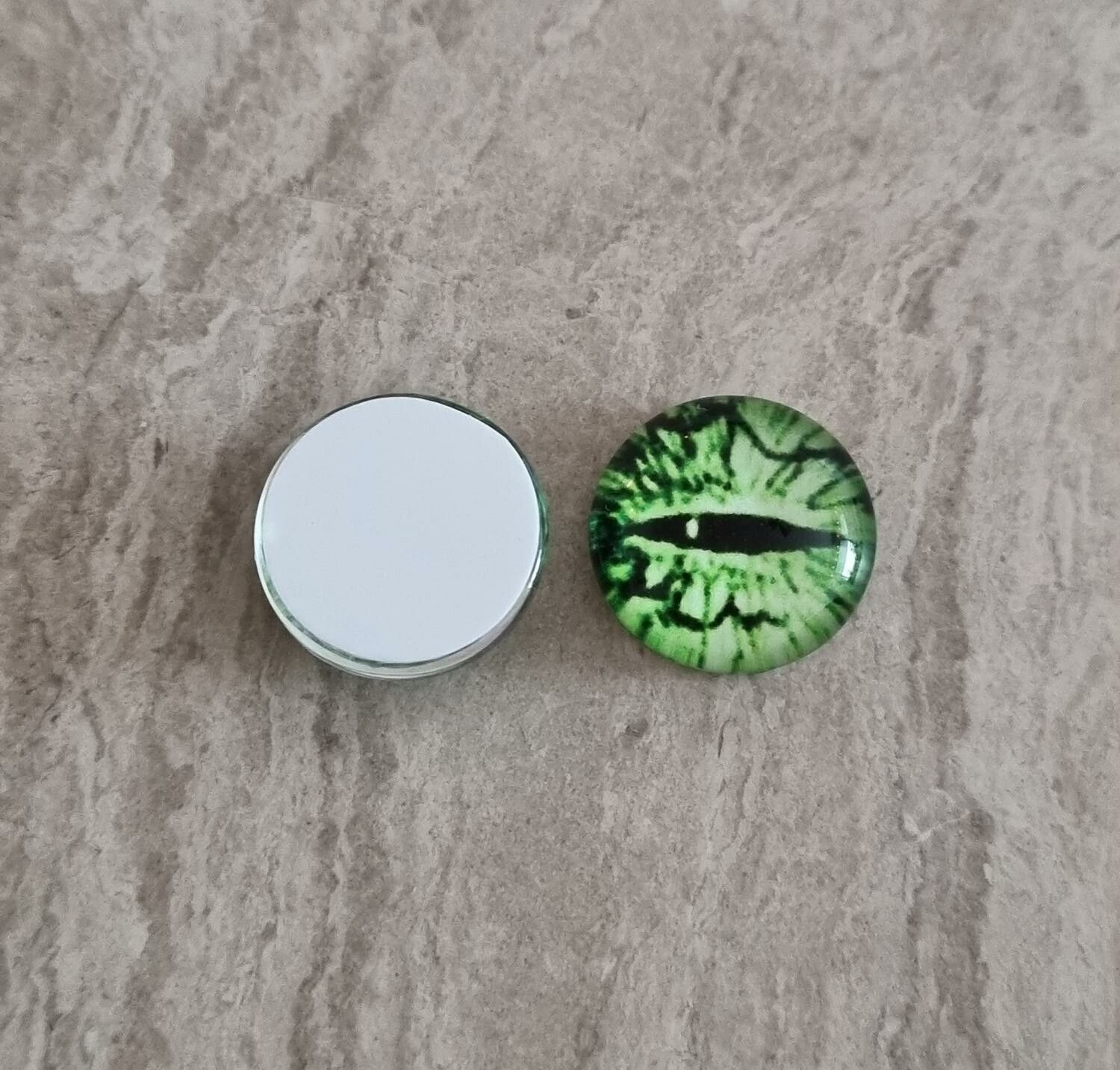 2 st drakögon kattögon i glas, glasinfattningar, cabochoner (12 mm)