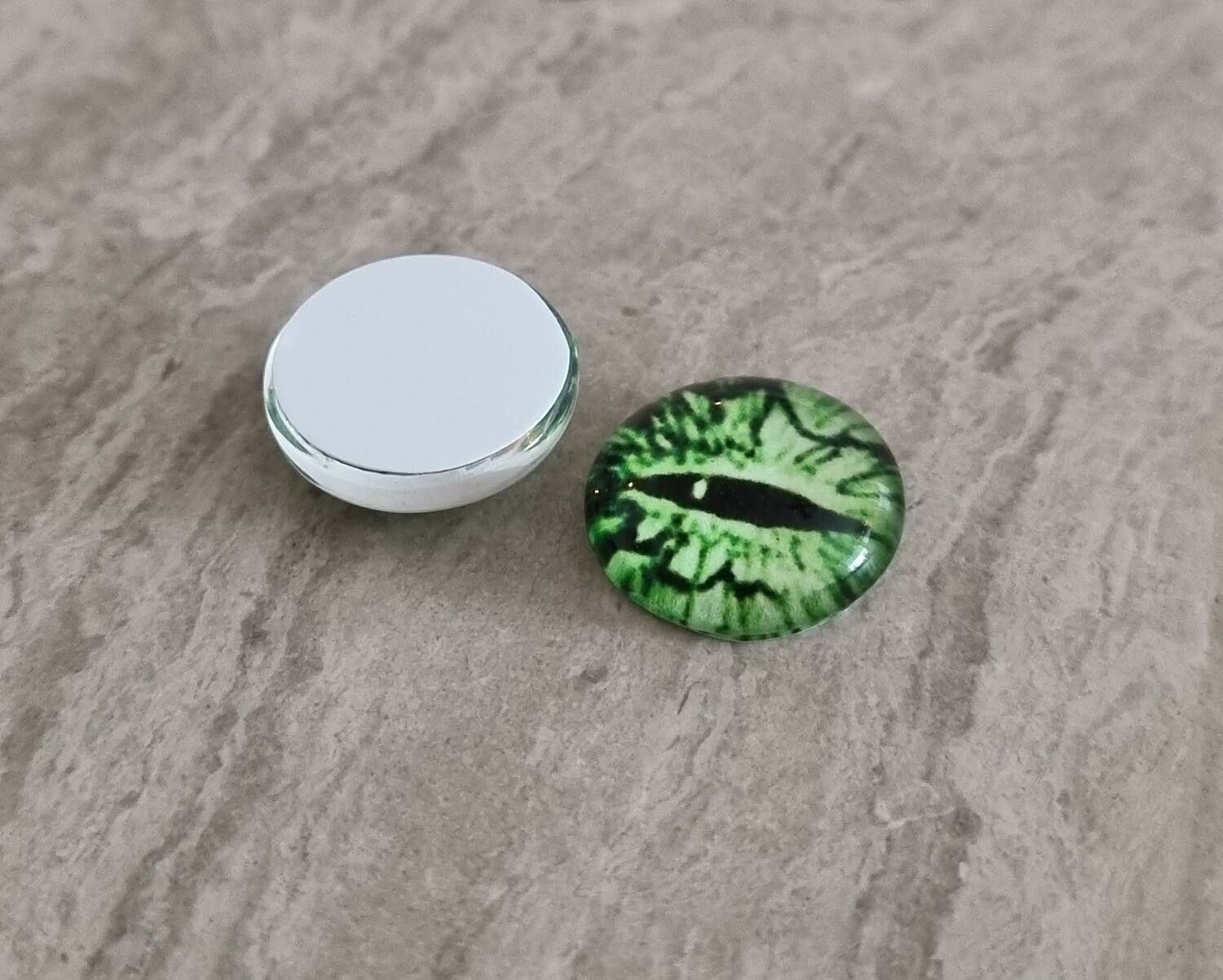 2 st drakögon kattögon i glas, glasinfattningar, cabochoner (12 mm)