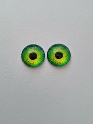 2 st drakögon kattögon i glas, glasinfattningar, cabochoner (12 mm)