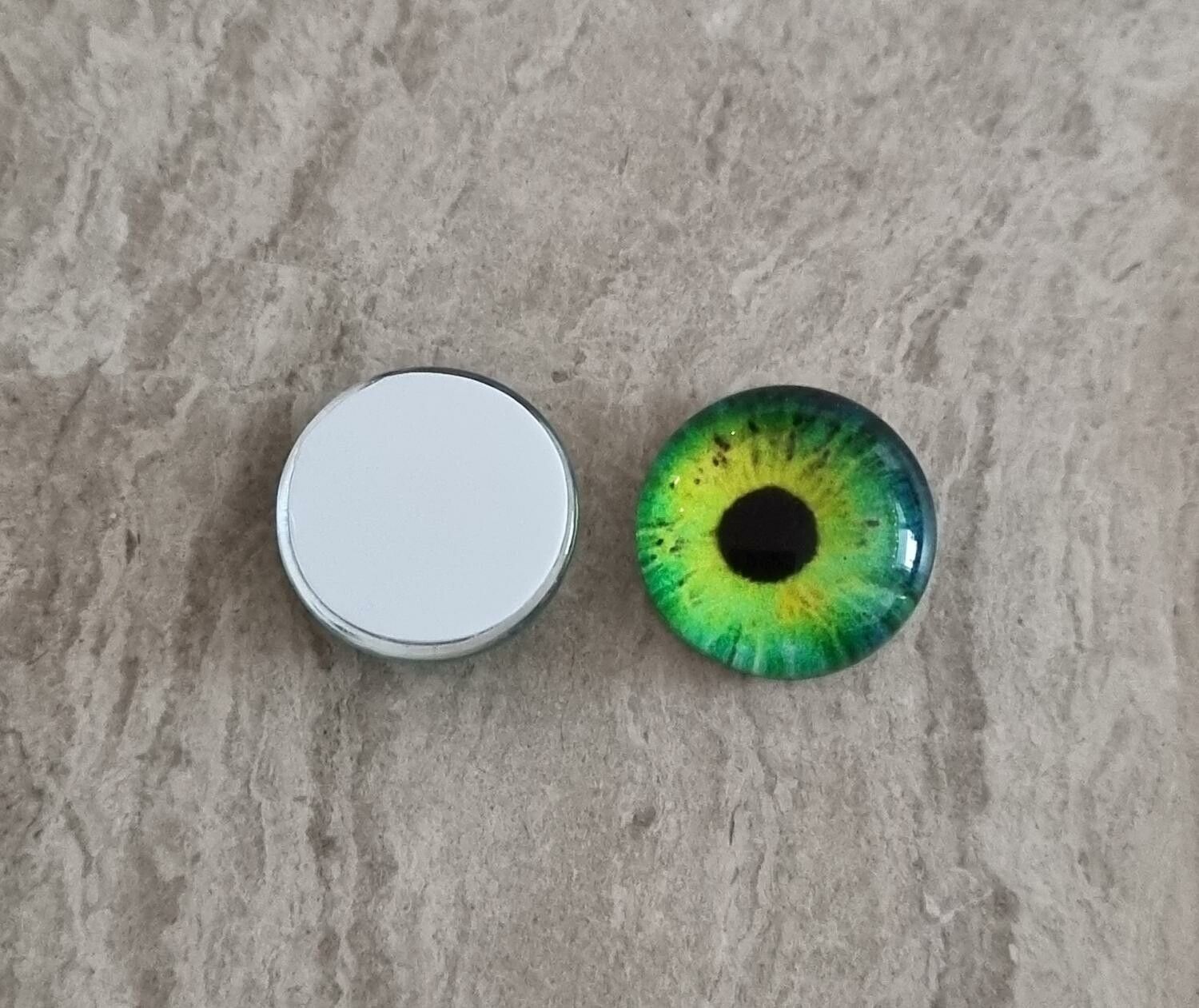 2 st drakögon kattögon i glas, glasinfattningar, cabochoner (12 mm)