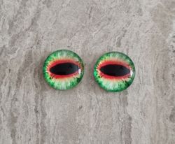 2 st drakögon kattögon i glas, glasinfattningar, cabochoner (12 mm)