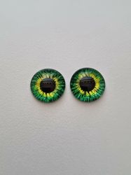 2 st drakögon kattögon i glas, glasinfattningar, cabochoner (12 mm)