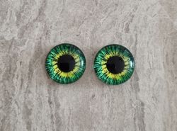 2 st drakögon kattögon i glas, glasinfattningar, cabochoner (12 mm)