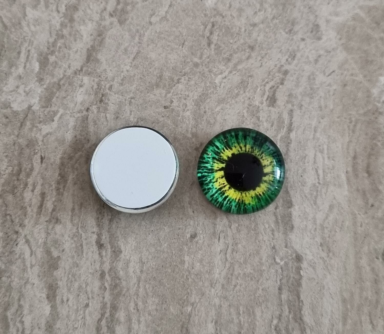2 st drakögon kattögon i glas, glasinfattningar, cabochoner (12 mm)