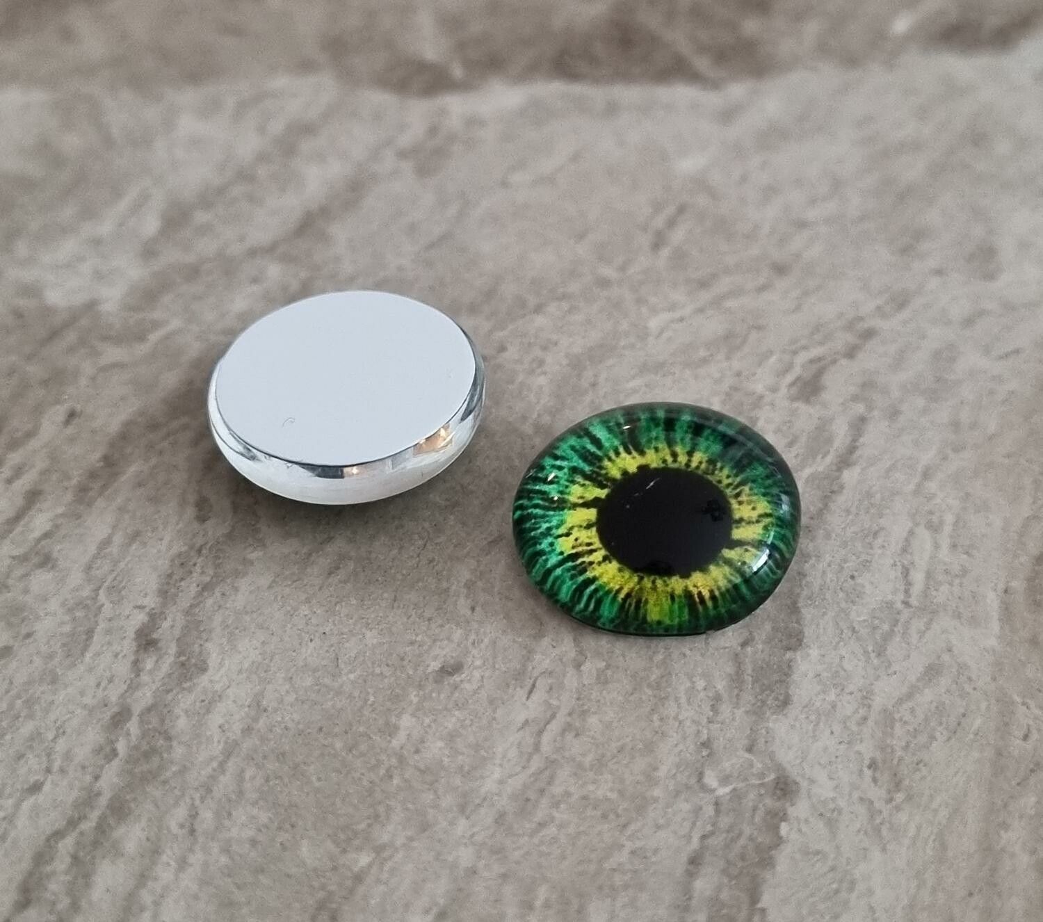 2 st drakögon kattögon i glas, glasinfattningar, cabochoner (12 mm)