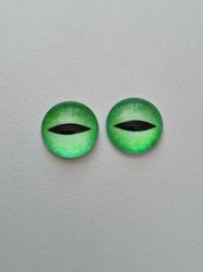 2 st drakögon kattögon i glas, glasinfattningar, cabochoner (12 mm)