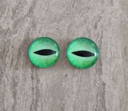 2 st drakögon kattögon i glas, glasinfattningar, cabochoner (12 mm)