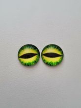 2 st drakögon kattögon i glas, glasinfattningar, cabochoner (12 mm)