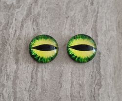 2 st drakögon kattögon i glas, glasinfattningar, cabochoner (12 mm)