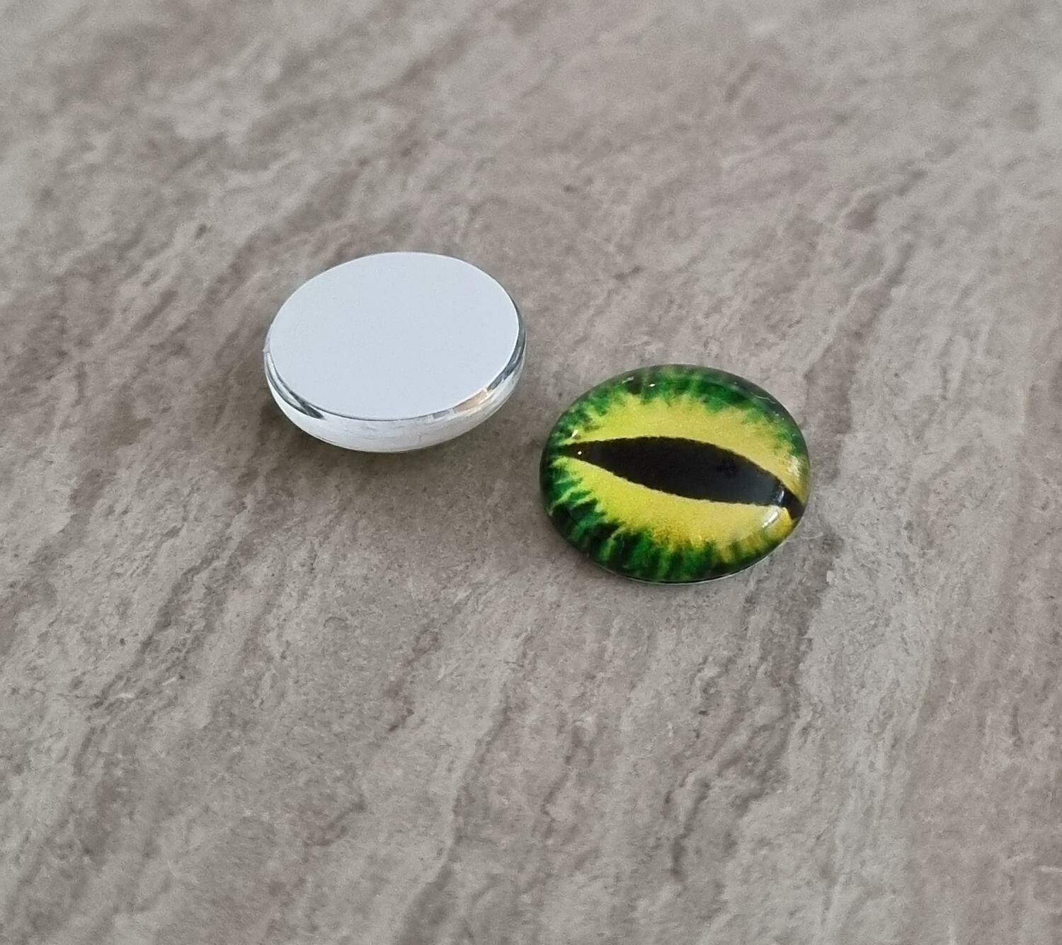 2 st drakögon kattögon i glas, glasinfattningar, cabochoner (12 mm)
