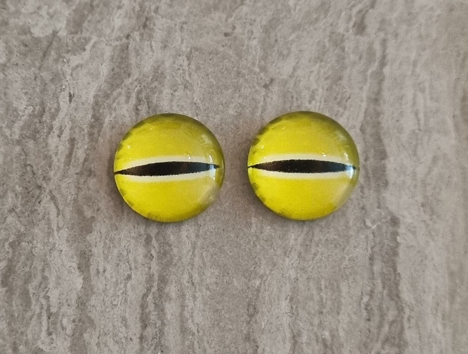 2 st drakögon kattögon i glas, glasinfattningar, cabochoner (12 mm)