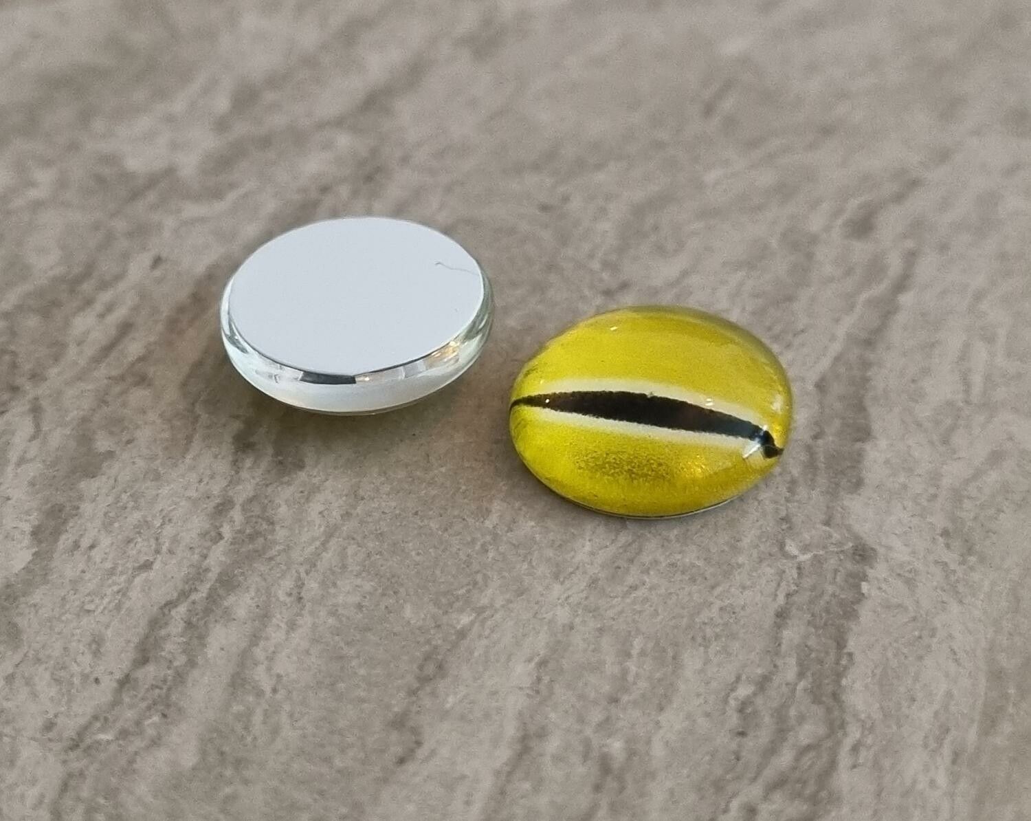 2 st drakögon kattögon i glas, glasinfattningar, cabochoner (12 mm)