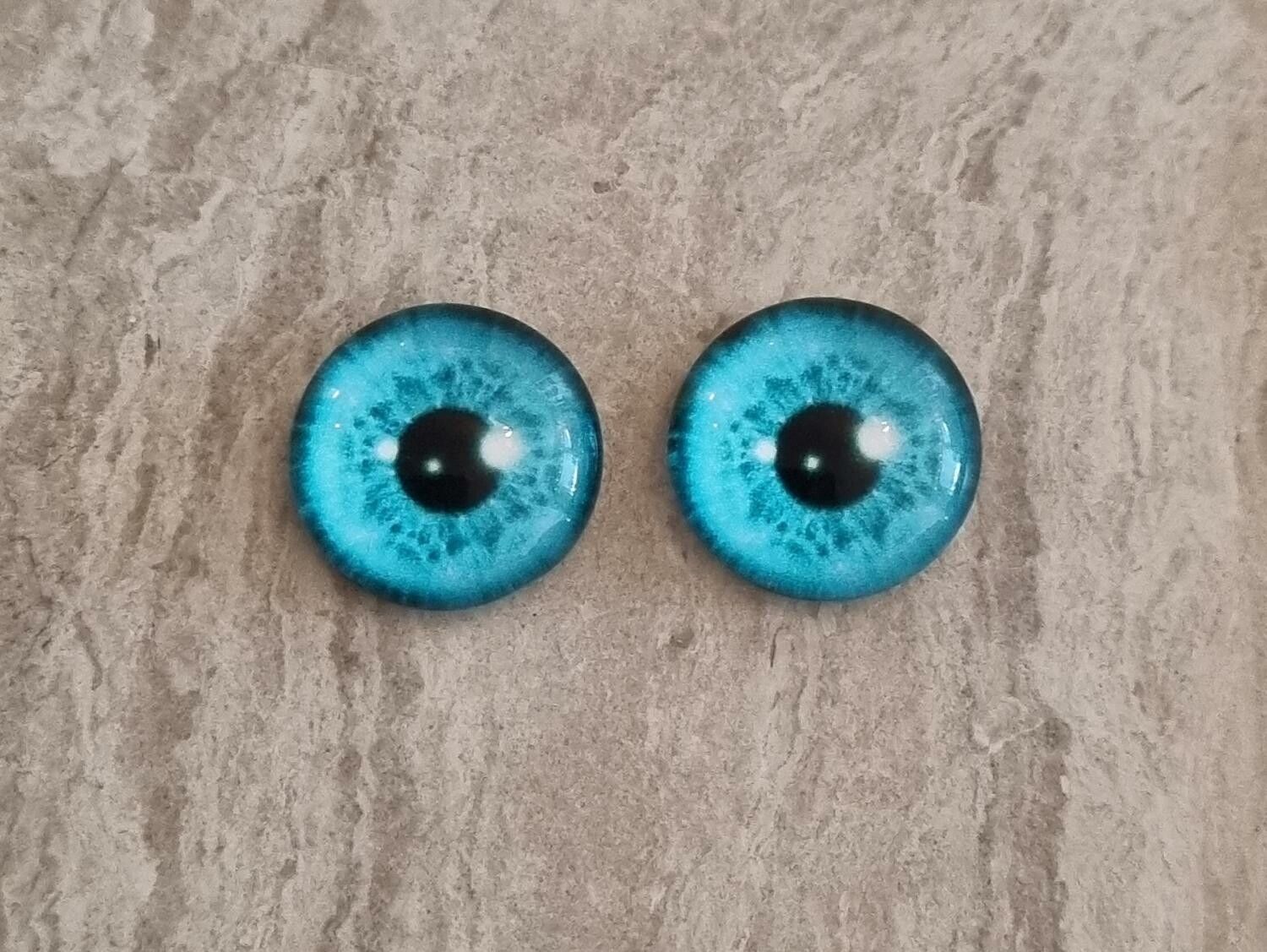 2 st drakögon kattögon i glas, glasinfattningar, cabochoner (12 mm)