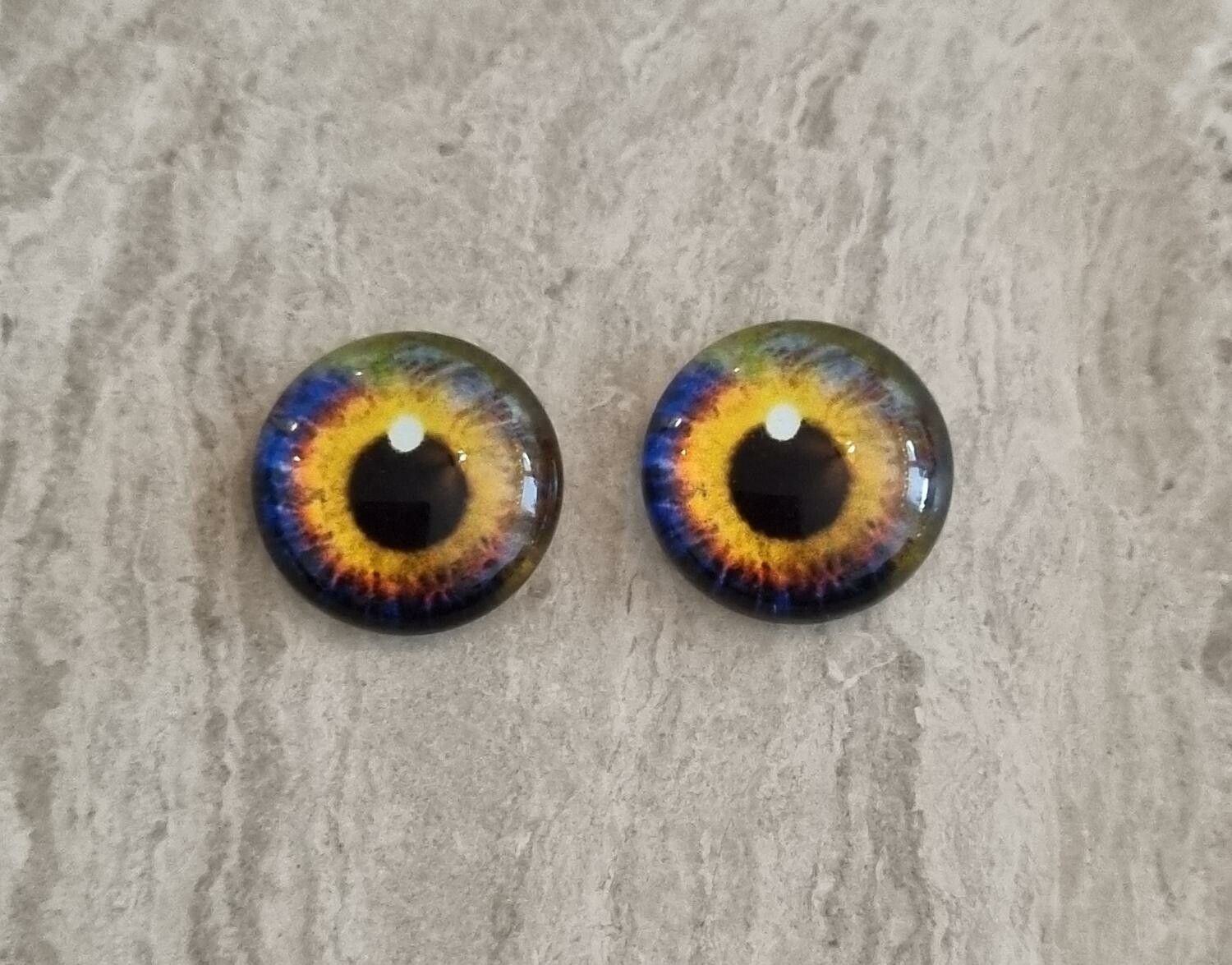 2 st drakögon kattögon i glas, glasinfattningar, cabochoner (12 mm)