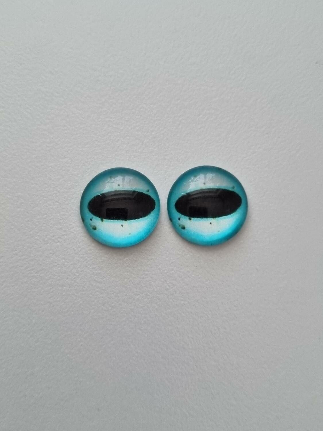 2 st drakögon kattögon i glas, glasinfattningar, cabochoner (12 mm)