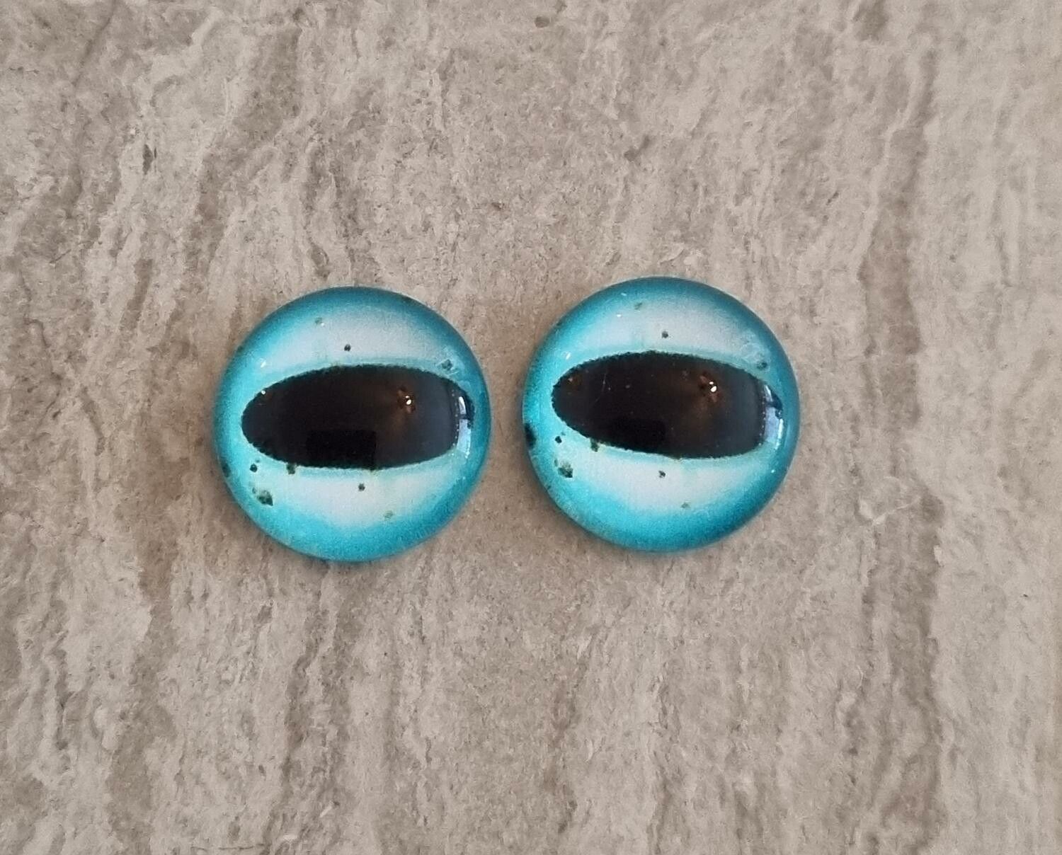 2 st drakögon kattögon i glas, glasinfattningar, cabochoner (12 mm)