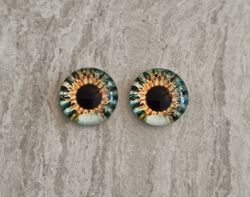 2 st drakögon kattögon i glas, glasinfattningar, cabochoner (12 mm)