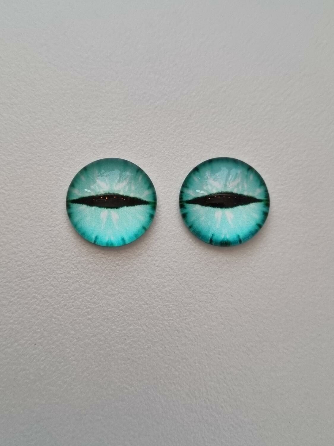 2 st drakögon kattögon i glas, glasinfattningar, cabochoner (12 mm)
