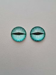 2 st drakögon kattögon i glas, glasinfattningar, cabochoner (12 mm)