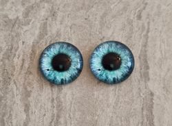 2 st drakögon kattögon i glas, glasinfattningar, cabochoner (12 mm)