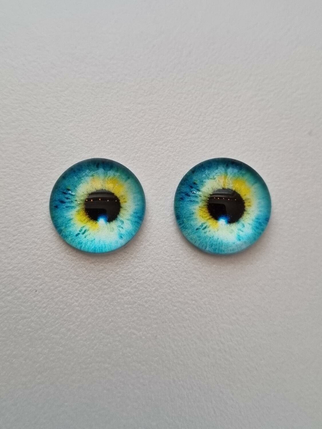 2 st drakögon kattögon i glas, glasinfattningar, cabochoner (12 mm)