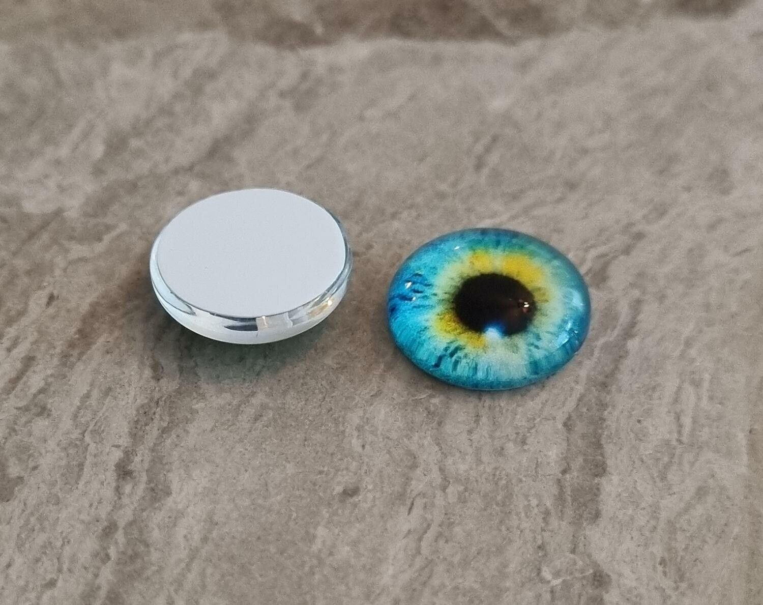 2 st drakögon kattögon i glas, glasinfattningar, cabochoner (12 mm)