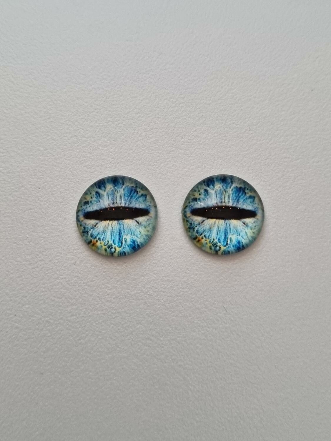 2 st drakögon kattögon i glas, glasinfattningar, cabochoner (12 mm)