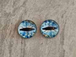 2 st drakögon kattögon i glas, glasinfattningar, cabochoner (12 mm)