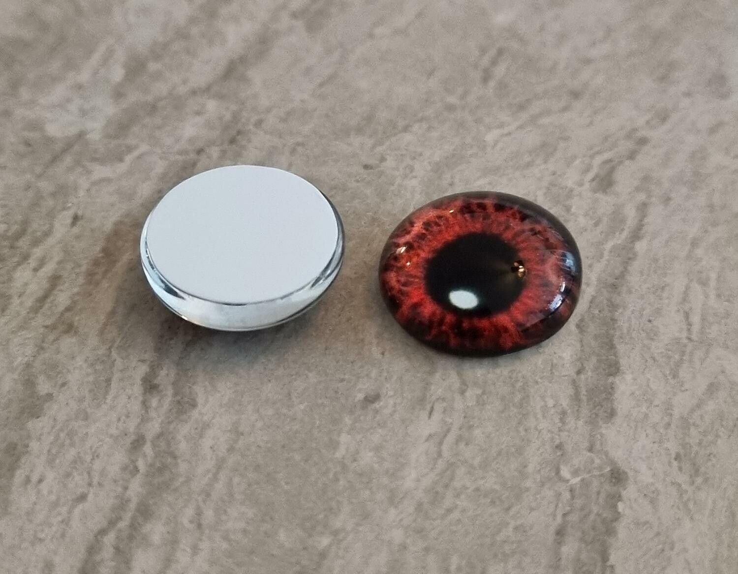 2 st drakögon kattögon i glas, glasinfattningar, cabochoner (12 mm)
