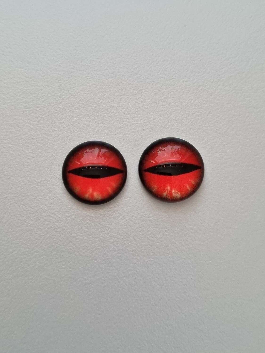 2 st drakögon kattögon i glas, glasinfattningar, cabochoner (12 mm)