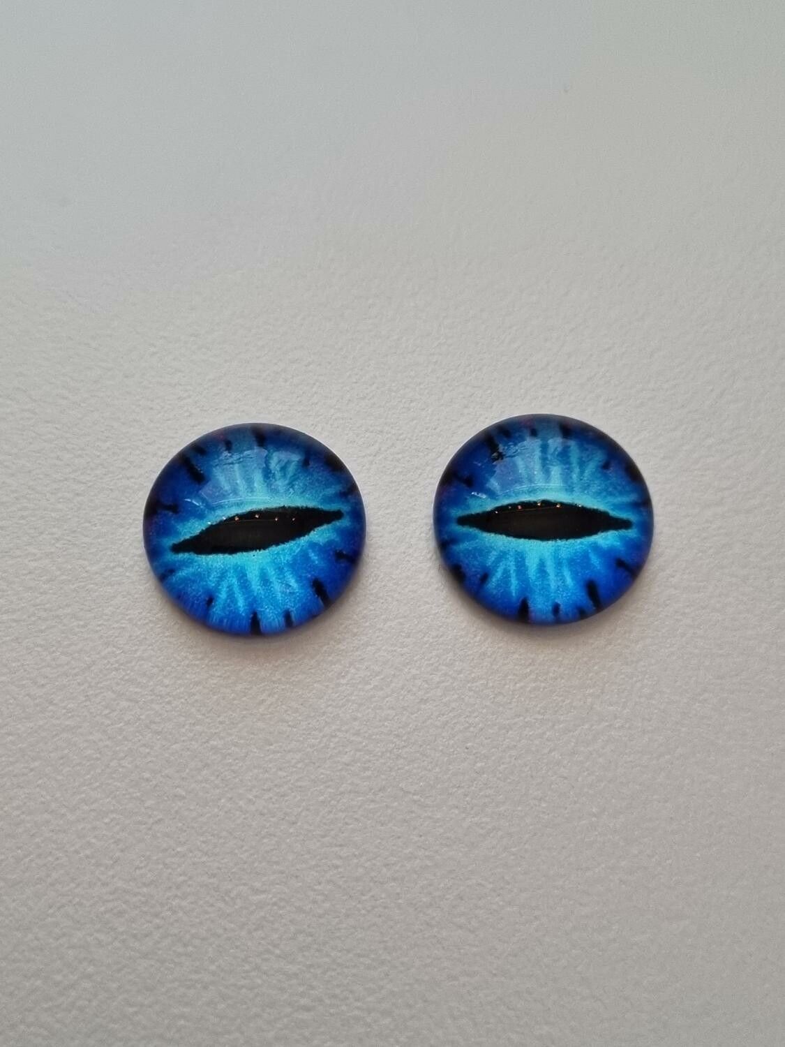 2 st drakögon kattögon i glas, glasinfattningar, cabochoner (12 mm)