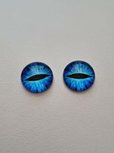 2 st drakögon kattögon i glas, glasinfattningar, cabochoner (12 mm)