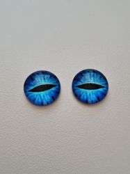 2 st drakögon kattögon i glas, glasinfattningar, cabochoner (12 mm)