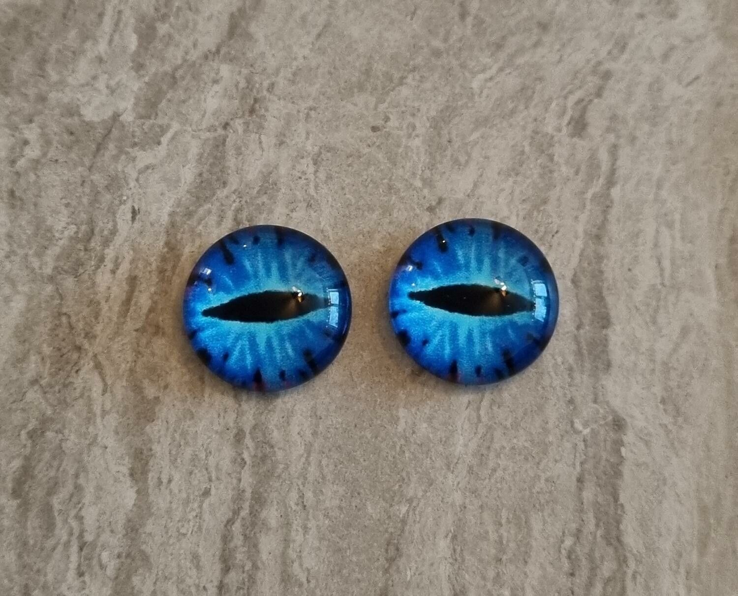 2 st drakögon kattögon i glas, glasinfattningar, cabochoner (12 mm)
