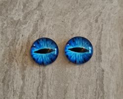 2 st drakögon kattögon i glas, glasinfattningar, cabochoner (12 mm)