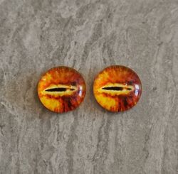 2 st drakögon kattögon i glas, glasinfattningar, cabochoner (12 mm)