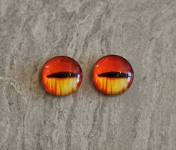 2 st drakögon kattögon i glas, glasinfattningar, cabochoner (12 mm)