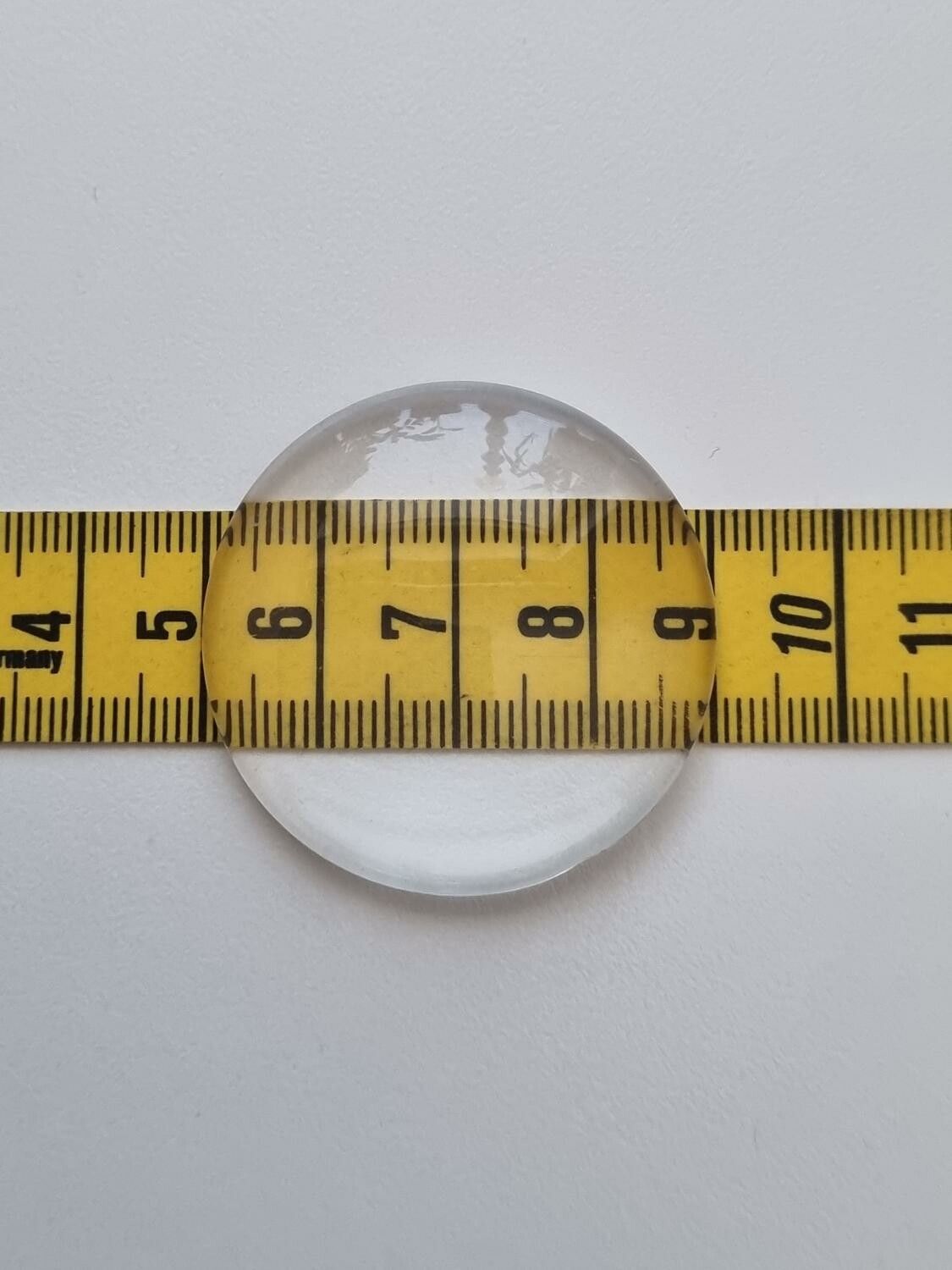1 stor transparent cabochon i glas, glasinfattning (40 mm)